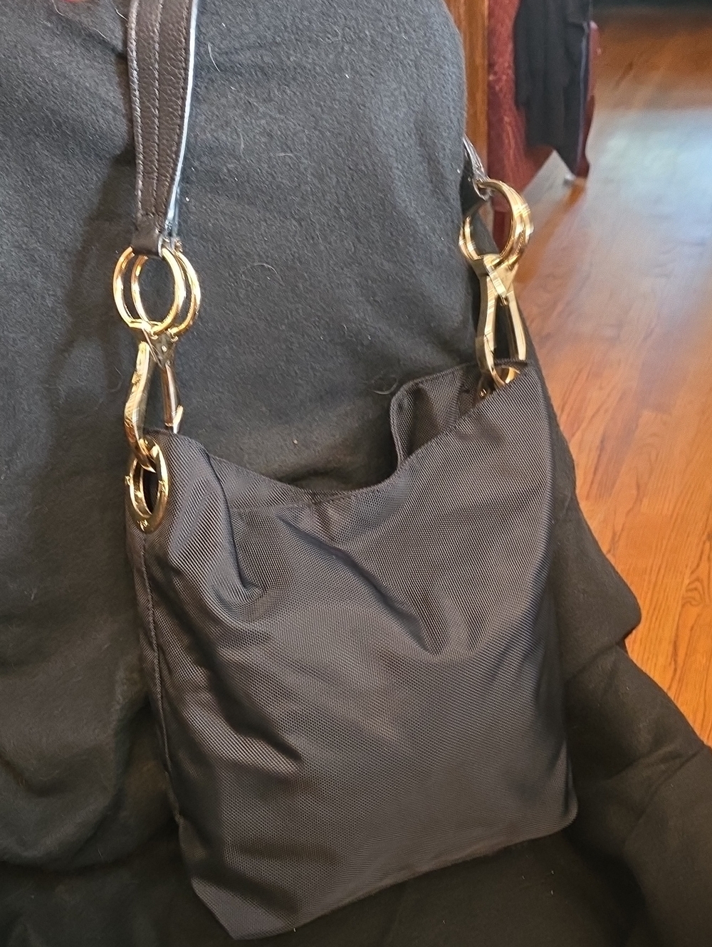 Black Shoulder Bag with Gold Ring Accents